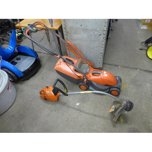 2320 - An electric Flymo lawnmower and petrol strimmer