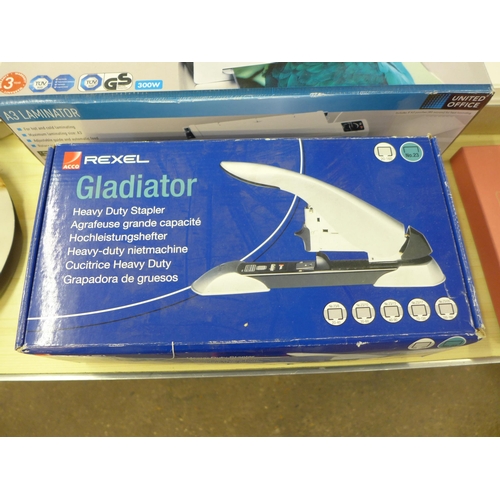 2331 - A job lot of stationery items including unused Gladiator heavy duty stapler, unused A3 laminator and... 