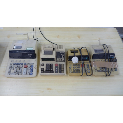 2332 - 4 Vintage electric calculators