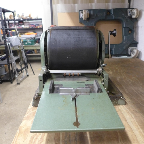 2342 - An inking vintage printing press