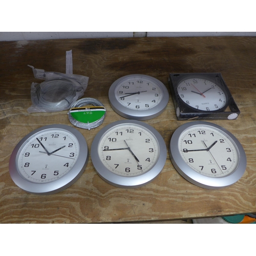 2392 - Five wall clocks and 2 Catenary wire kits