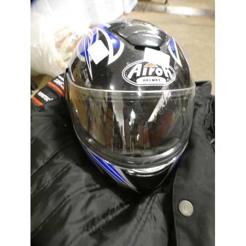 2452 - An Airohi bike helmet with padded motorbike clothes