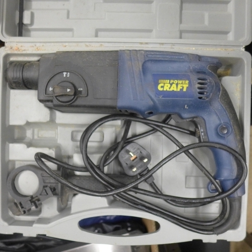 2020A - A Ryobi impact drill (model E108002RE) and a Powercraft SDS hammer drill both in cases