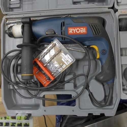 2020A - A Ryobi impact drill (model E108002RE) and a Powercraft SDS hammer drill both in cases