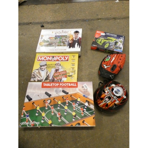 2504 - A box of toys and games including- Only Fools and Horses Monopoly, Harry Potter board game, table fo... 