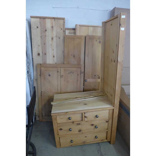 1534 - A pine four door combination wardrobe