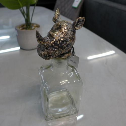 1399 - A glass storage bottle with rhino head stopper, H 24cms (HKL3506)   #