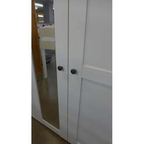 1508 - A four door mirrored wardrobe  *This lot is subject to VAT