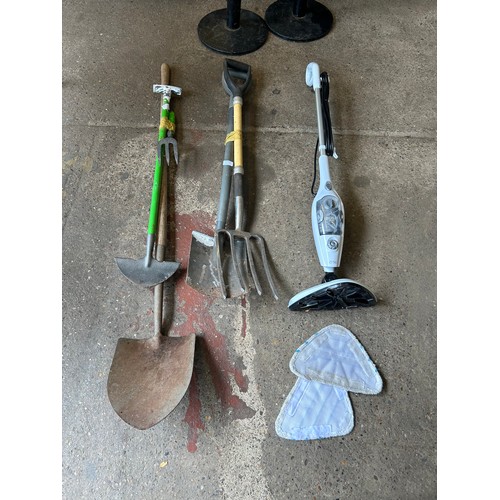 2279 - Garden tools including spades, a pitch fork, garden hoe and a Bush steam mop