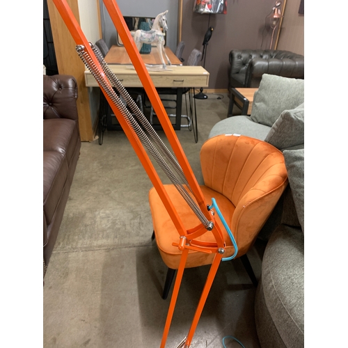 1409 - A orange floor standing anglepoise lamp