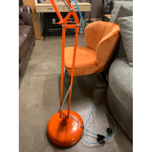 1409 - A orange floor standing anglepoise lamp