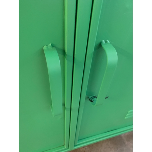 1433 - A green industrial style metal cabinet