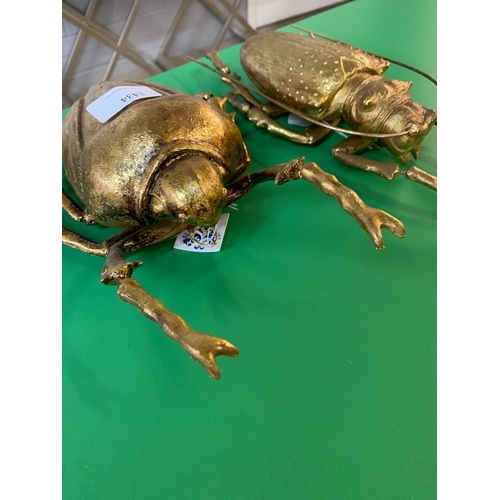 1434 - A set of two gold painted beetle wall hanging/table ornaments