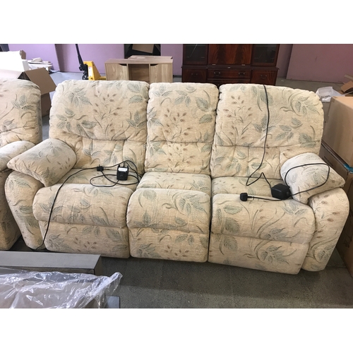 1530 - A G-Plan cream floral electric reclining three seater sofa, two seater sofa, armchair and footstool