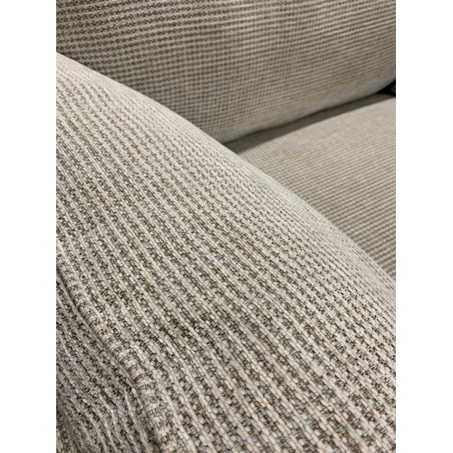 1446 - A light grey textured weave oversized armchair