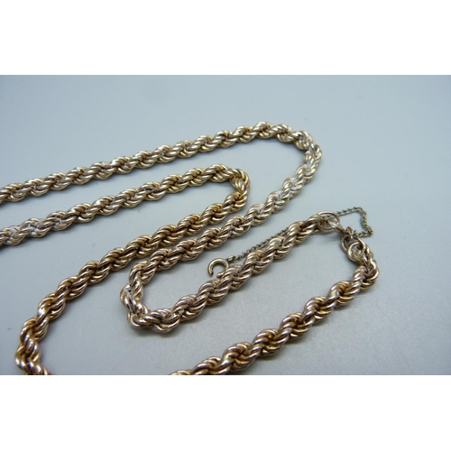 1010 - A 9ct gold rope twist chain, 18g, 55cm