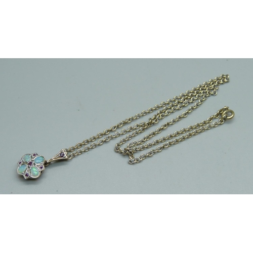 1012 - A 9ct gold, opal and ruby set pendant and chain, 4.7g, 38cm