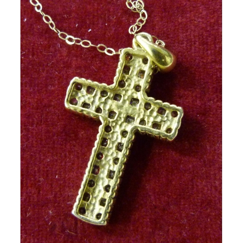 1013 - A yellow metal stone set cross pendant, tests as 9ct gold on a fine 9ct gold chain, 4.9g