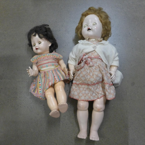 1035 - Two antique dolls with sleep eyes **PLEASE NOTE THIS LOT IS NOT ELIGIBLE FOR POSTING AND PACKING**