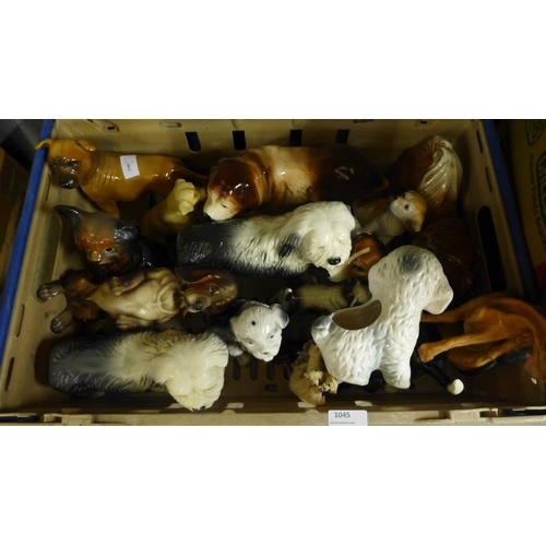 1045 - A collection of dog figures **PLEASE NOTE THIS LOT IS NOT ELIGIBLE FOR POSTING AND PACKING**