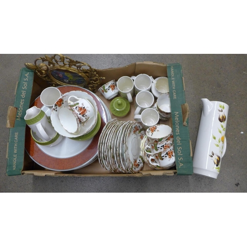 1067 - A Crown Devon coffee service, a tea service, twelve large chargers and a metal framed picture **PLEA... 