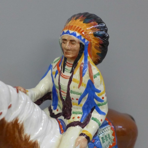 603 - A Beswick 'Red Indian' on horseback, gloss finish, model 1391, one leg restored