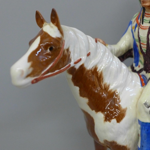 603 - A Beswick 'Red Indian' on horseback, gloss finish, model 1391, one leg restored