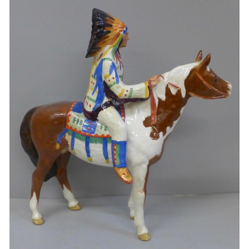 603 - A Beswick 'Red Indian' on horseback, gloss finish, model 1391, one leg restored