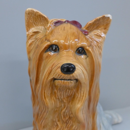 615 - A Beswick fireside Yorkshire terrier, chips to one ear