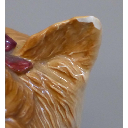 615 - A Beswick fireside Yorkshire terrier, chips to one ear