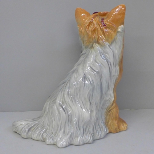 615 - A Beswick fireside Yorkshire terrier, chips to one ear