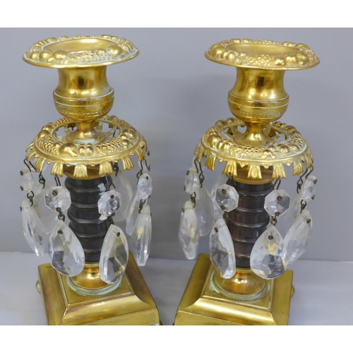 628 - A pair of Regency gilt bronze candle lustres, 18.5cm