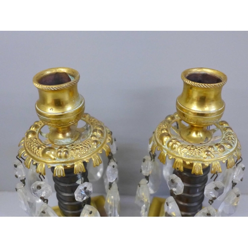 628 - A pair of Regency gilt bronze candle lustres, 18.5cm