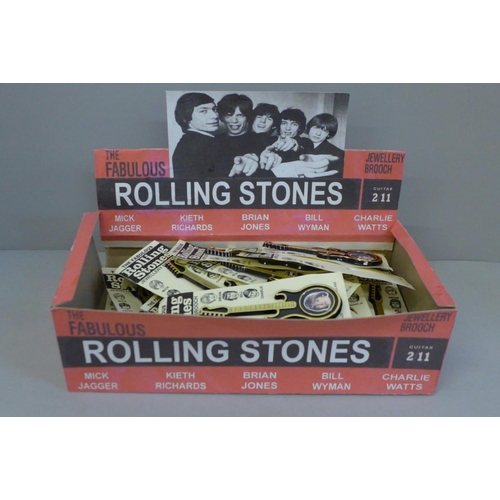 630 - Rolling Stones guitar brooches, (25), in a reproduction box