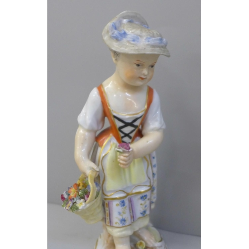 655 - A 19th Century porcelain figure of a girl holding a basket of flowers and an early 19th Century drin... 