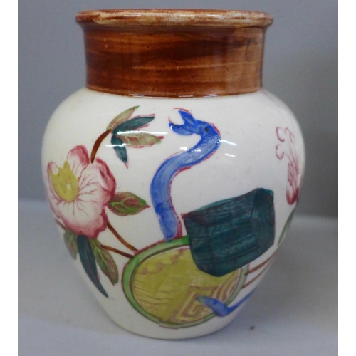 658 - A Victorian dove posy vase and a Moore & Co. vase