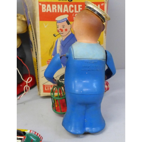 664 - A Tri-ang Minic Barnacle Bill toy and other tin plate and vintage toys