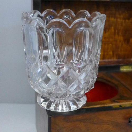 671 - A 19th Century walnut tea caddy with glass jar and key