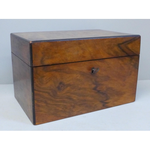 671 - A 19th Century walnut tea caddy with glass jar and key