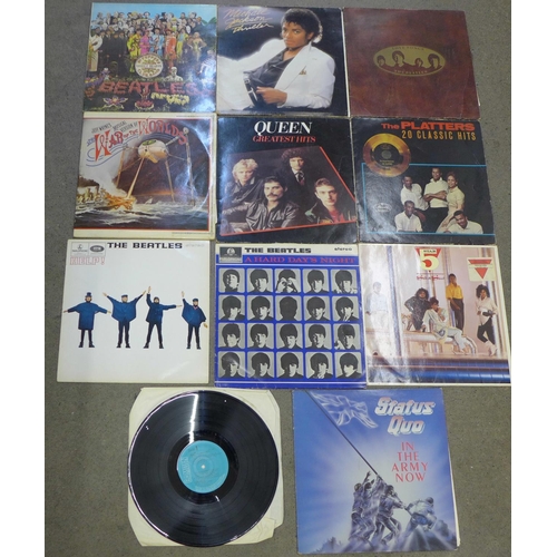 705 - A collection of records including The Beatles Sgt. Pepper, still with original cut out insert