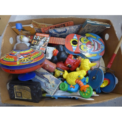 729 - A box of assorted vintage toys