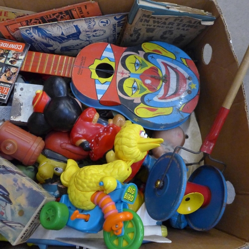 729 - A box of assorted vintage toys