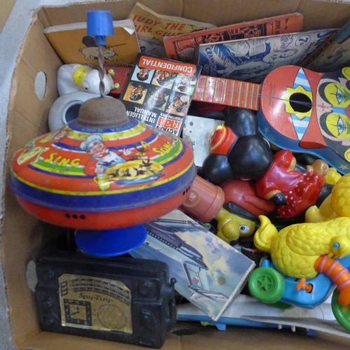 729 - A box of assorted vintage toys