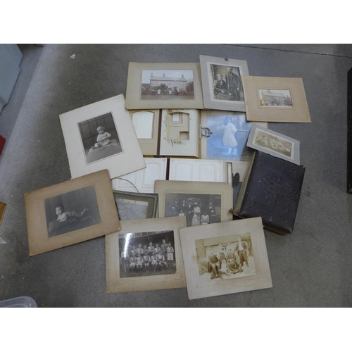 734 - An album of CDV and cabinet cards, two empty albums and loose 19th Century mounted photographs