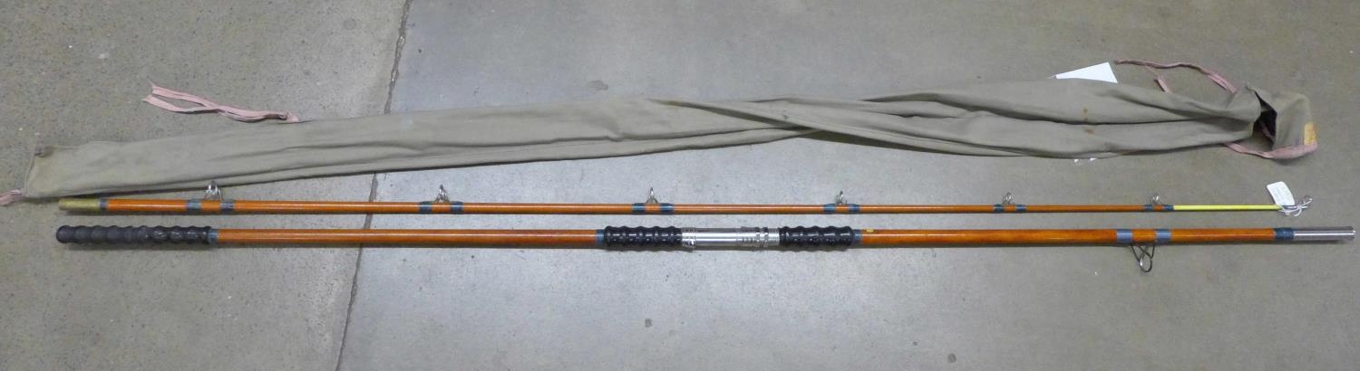 A 12ft two piece fibreglass beach/surf casting fishing rod, made in England  by Rodrill, London in th