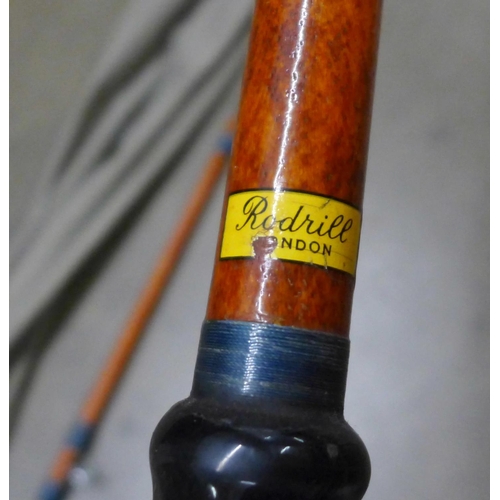 A 12ft two piece fibreglass beach/surf casting fishing rod, made in England  by Rodrill, London in th