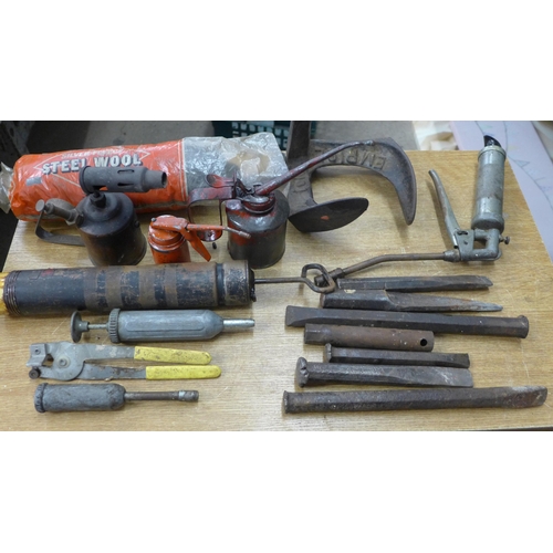 2049 - A collection of vintage tools including oil cans, grease guns and chisels