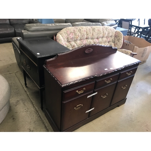 1587 - A mahogany three drawer and three door sideboard, sofa and cabinet