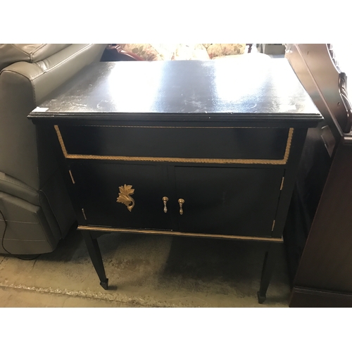 1587 - A mahogany three drawer and three door sideboard, sofa and cabinet