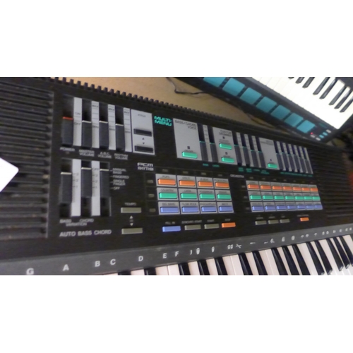 2149 - A Yamaha P55-570 electronic keyboard - Clavier Electronique Portasound